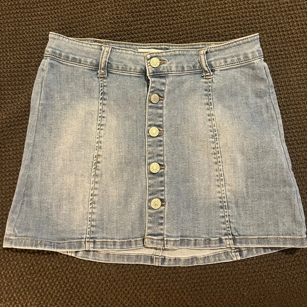 Jean skirts. Rips- size small. Buttons- size 27. - Picture 2 of 2